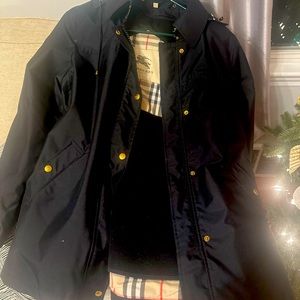 Burberry coat with detachable vest.  Size women’s large.  Very cute!